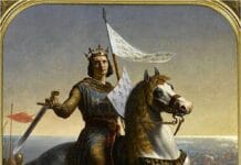 Św. Ludwik IX: król, który połączył wiarę, rodzinę i służbę ubogim Obraz olejny Émile'a Signola: św. Ludwik IX w koronie i złocistej zbroi na siwym koniu, z uniesionym mieczem i chorągwią z liliami, na morskim brzegu.