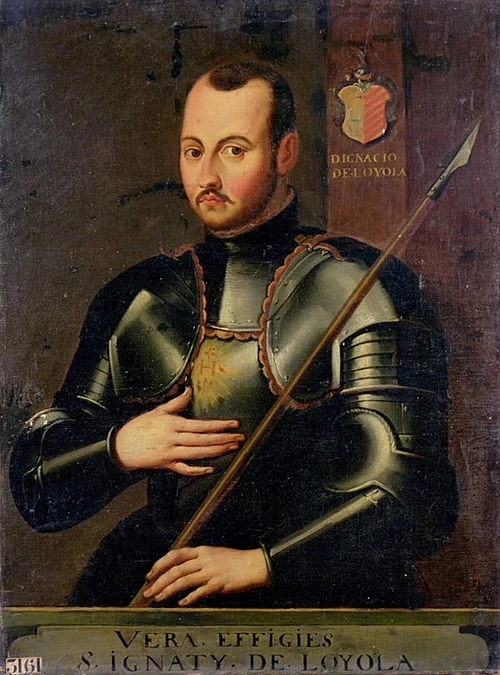 500px-Ignatius_of_Loyola_militant Portret św. Ignacego Loyoli w pełnej zbroi rycerskiej, z drzewcem włóczni w ręku i herbem rodu Loyola w tle