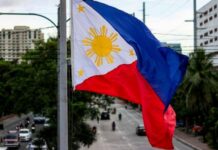 Czas dla Stworzenia na Filipinach 2026: wiara, ekologia i sprawiedliwość Flaga Filipin powiewa nad ruchliwą ulicą w Manili; zdjęcie ilustracyjne do tekstu o obchodach Czasu dla Stworzenia — nie dokumentuje opisywanych wydarzeń